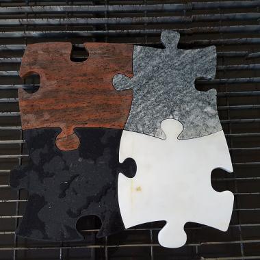 puzzle spessore 30 mm realizzato con vari marmi e graniti